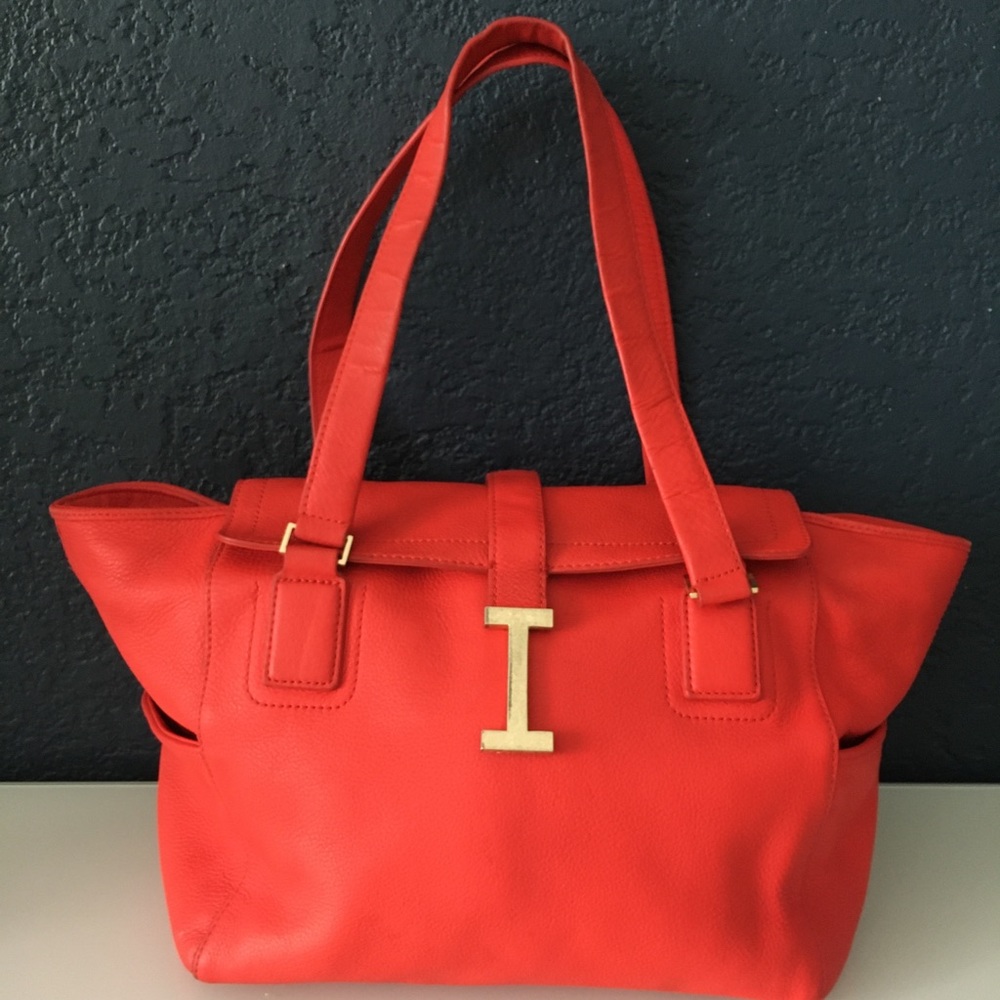 Lovely purse from Isaac Mizrahi New York, bright red, leather.
